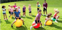 students playing field day games